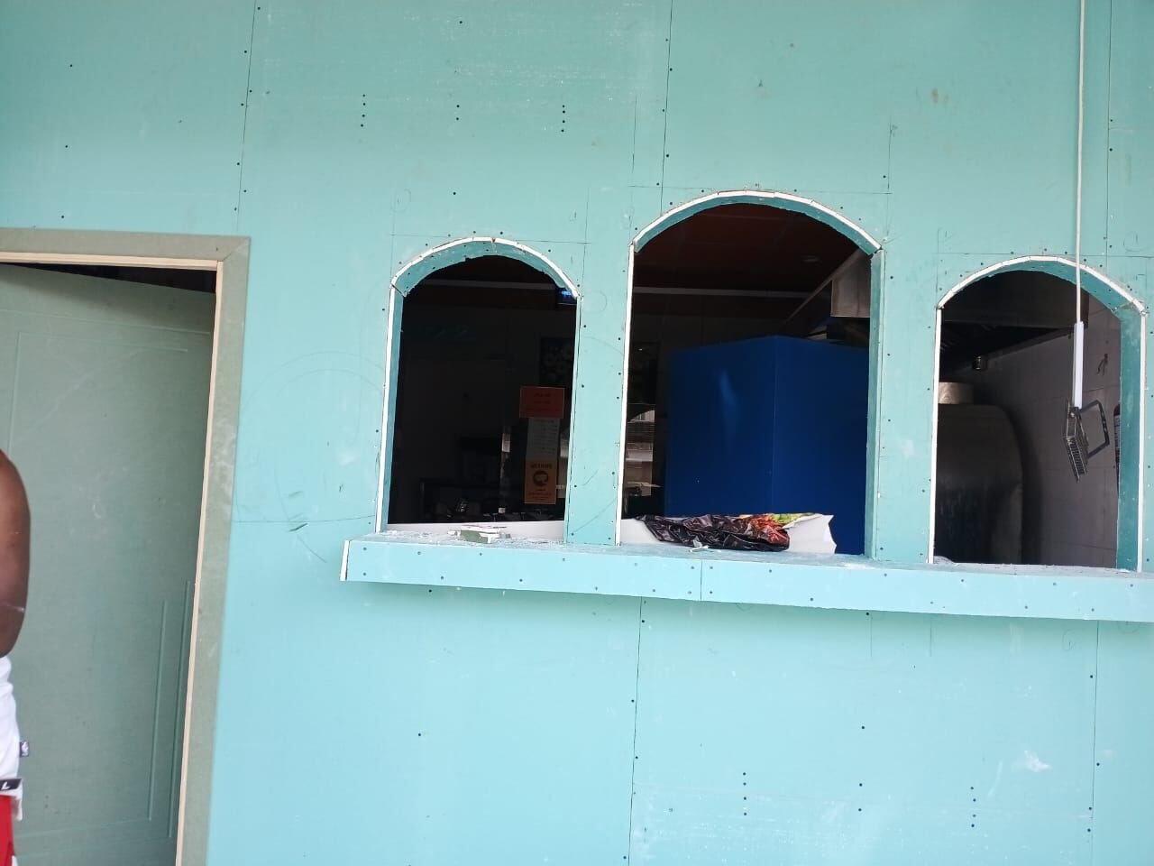 Commercial gypsum facade with arched openings