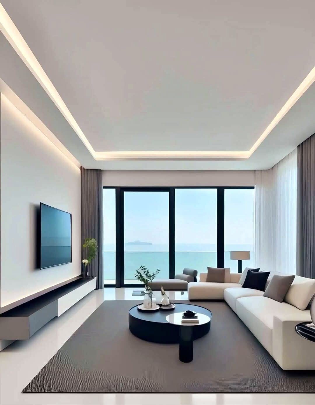 Modern living room with gypsum cove ceiling and sea view