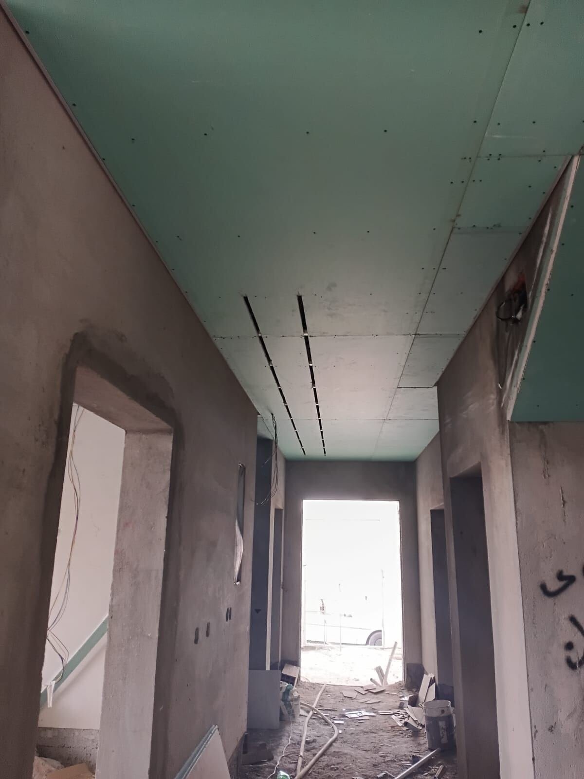 Hallway ceiling installation with recessed lighting channels